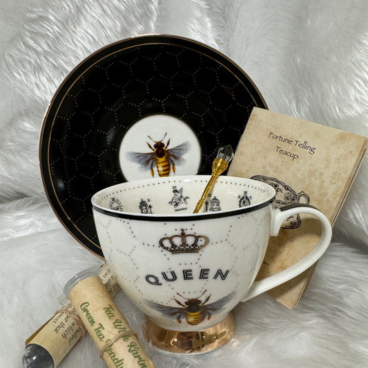 Black and gold bee tea cup and saucer set. 22 Major Arcana Tarot Symbols. Tea Leaf Reading Set