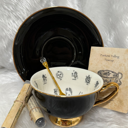 Black and gold tea cup and saucer set. 22 Major Arcana Tarot Symbols. Tea Leaf Reading Set