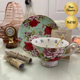 Mint red rose floral tea leaf reading cup set with gold crystal teaspoon, loose-leaf tea tube samplers and saucer, displayed with Fortune Telling Teacup card