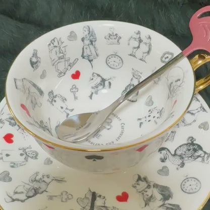 Alice in Wonderland. Learn tea leaf reading. Porcelain tea cup saucer. Fortune telling. FREE course. Spiritual guidance.
