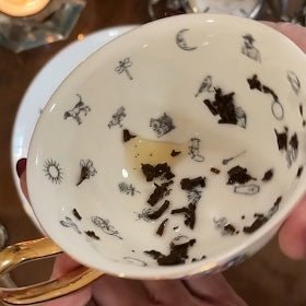 Reading Drip Patterns and Saucer Symbols in Tasseography