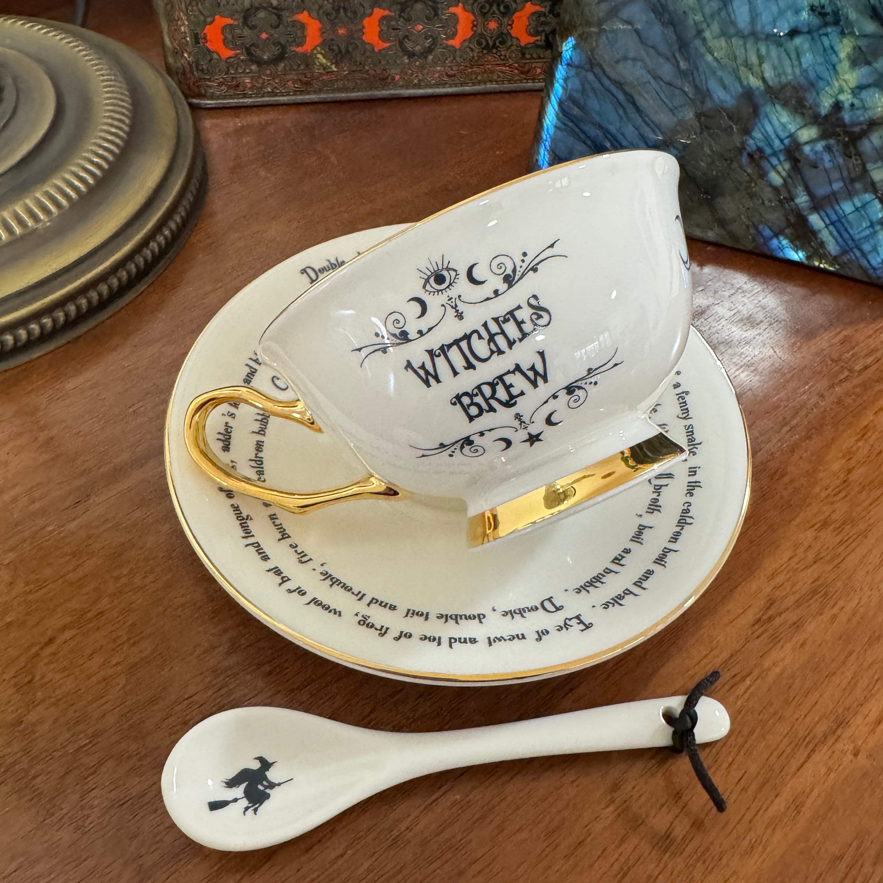 Witches Brew Tea Leaf Reading Teacup Set 227 – White witches brew teacup from above, showing saucer and 24ct gold tea leaf reading symbols
