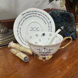 Witches Brew Tea Leaf Reading Teacup Set 227 – White bone china teacup with hand-painted 24ct gold witches brew divination symbols