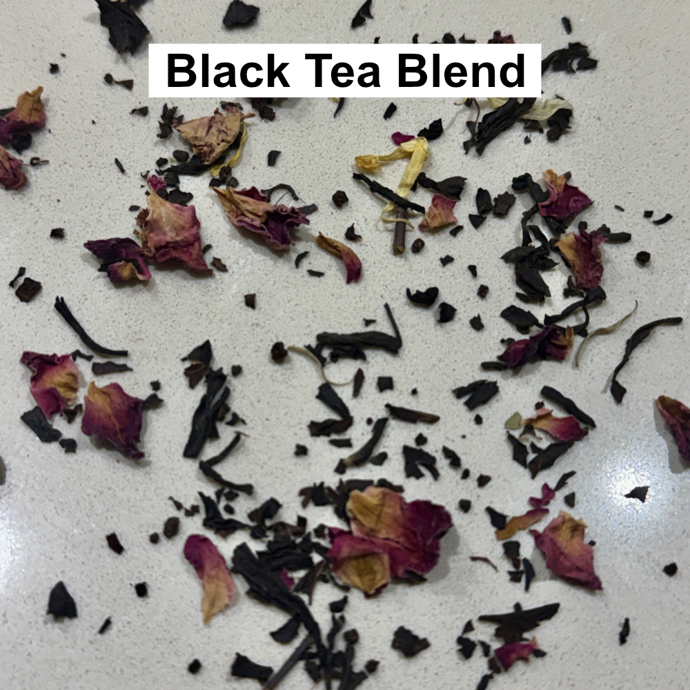 Karin's own Black tea blend with dried flowers on a light background