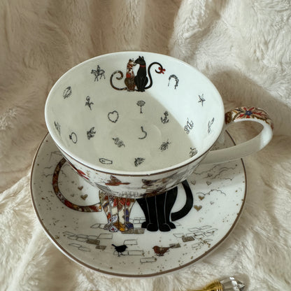 Whimsical cat fortune teller teacup, perfect for adding a touch of magic to your tea time. Full tea leaf reading kit with free course. Perfect gift.