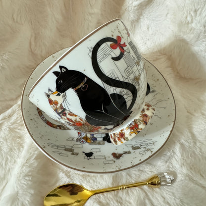 Elegant teacup adorned with a detailed illustration of a cat in a fortune teller’s attire. Full tea leaf reading kit with free course. Perfect gift.