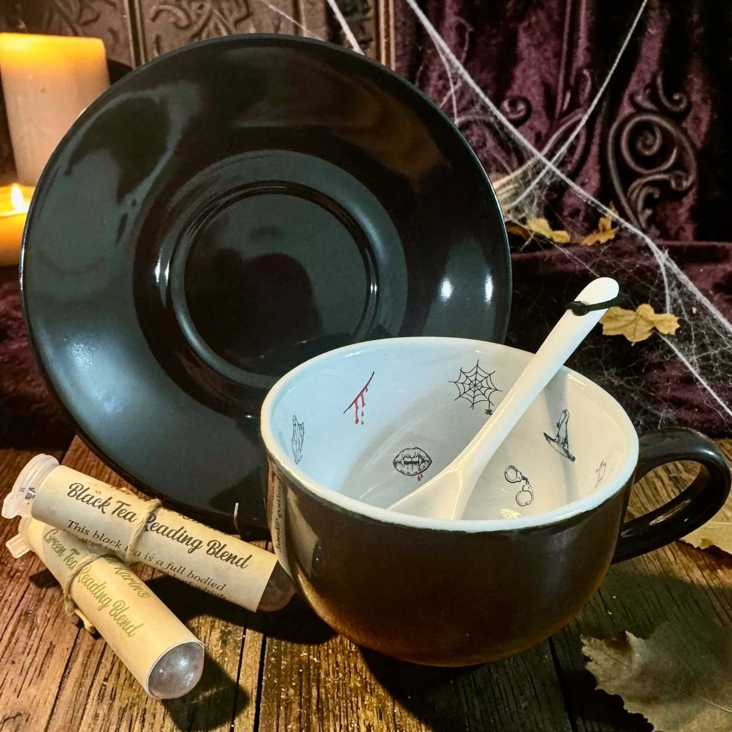 Black Halloween tea leaf reading set with teacup, saucer and little bat teaspoon