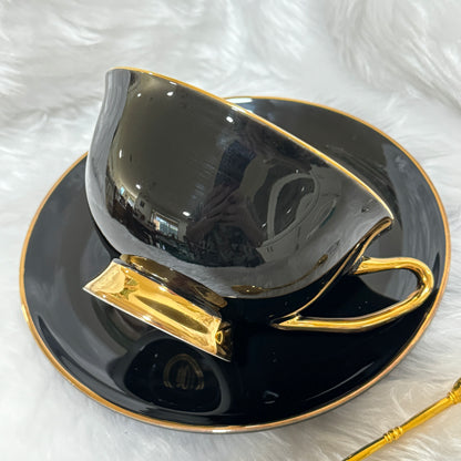 Jet Black and gold tea cup and saucer set. 22 Major Arcana Tarot Symbols. Tea Leaf Reading Set