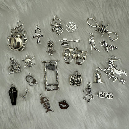 Halloween charms for charm casting divination.