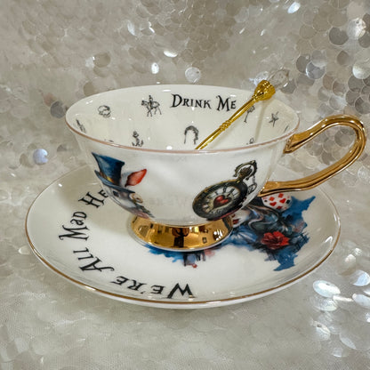 Alice in Wonderland Tea cup and saucer set. Punk style Alice. Learn tea leaf reading the easy way. FREE online course.