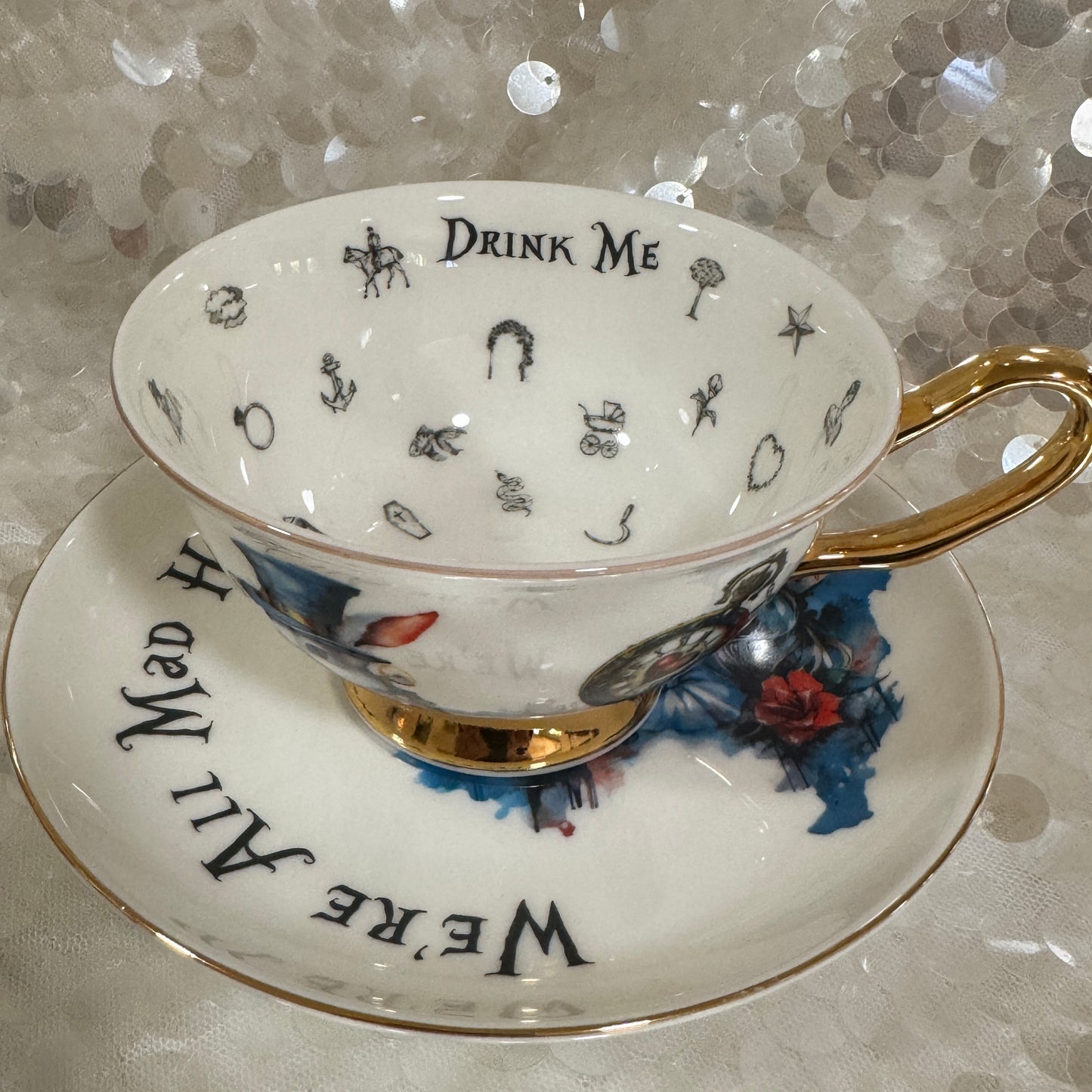 Alice in Wonderland Tea cup and saucer set. Punk style Alice. Learn tea leaf reading the easy way. FREE online course.