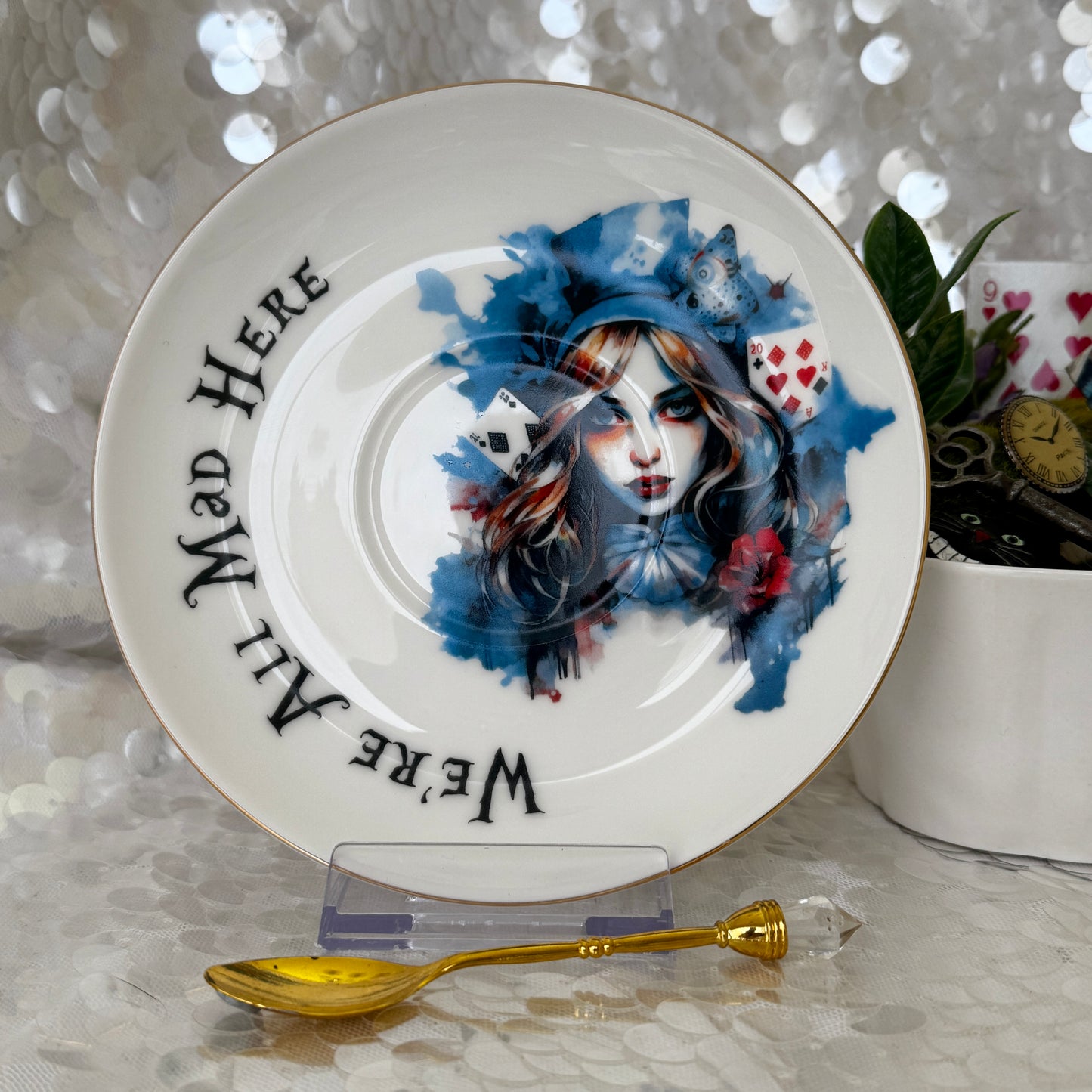 Alice in Wonderland Tea cup and saucer set. Punk style Alice. Learn tea leaf reading the easy way. FREE online course.