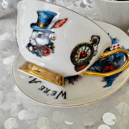 Alice in Wonderland Tea cup and saucer set. Punk style Alice. Learn tea leaf reading the easy way. FREE online course.