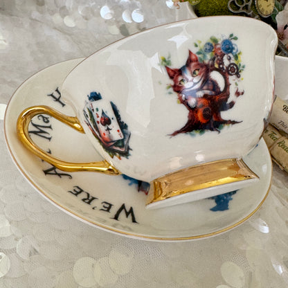 Alice in Wonderland Tea cup and saucer set. Punk style Alice. Learn tea leaf reading the easy way. FREE online course.