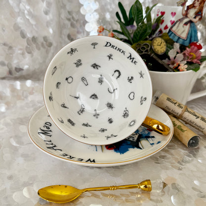 Alice in Wonderland Tea cup and saucer set. Punk style Alice. Learn tea leaf reading the easy way. FREE online course.