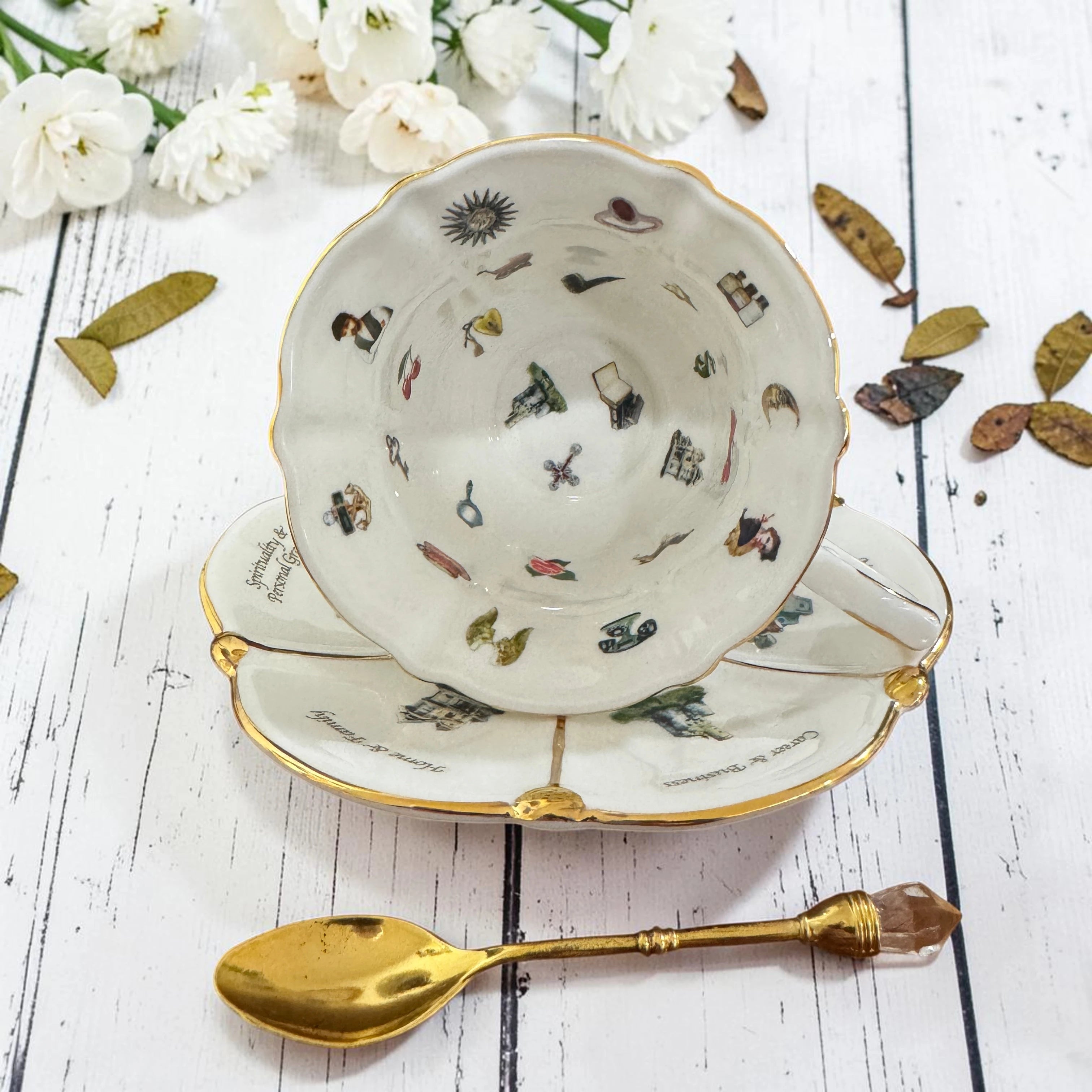 Inside view of the Labyrinth Through Time white teacup showing tea leaf reading symbols
