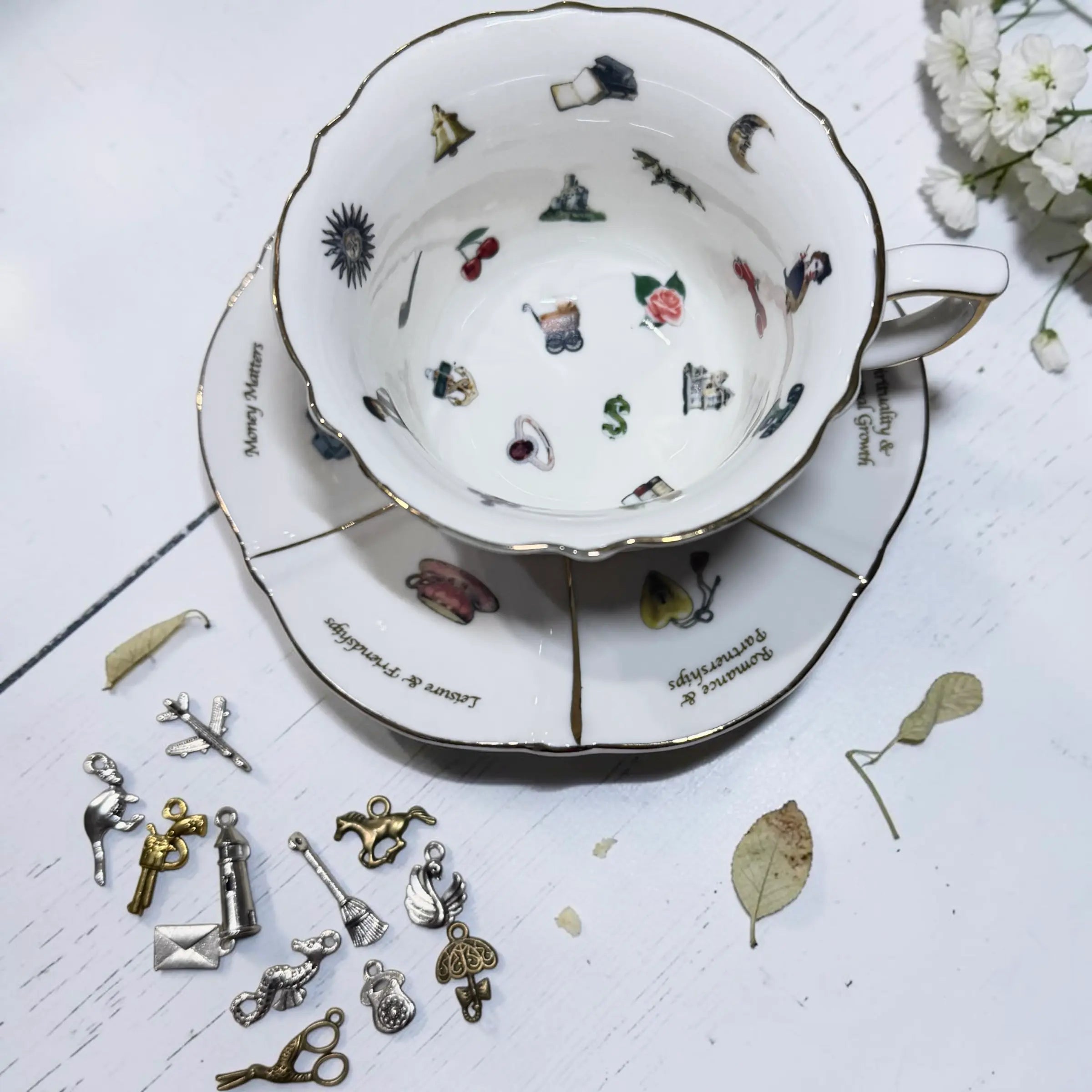Labyrinth teacup and saucer with bonus charms