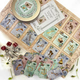 This is a full divination system all in one travel kit tin.  It has washable spandex mat and 18 cards and 18 charms and 3 dice.