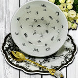 Decorative tea set with embossed bird motifs, perfect for divination and spiritual rituals