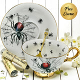 Spider-teacup with intricate web pattern and gloss finish
