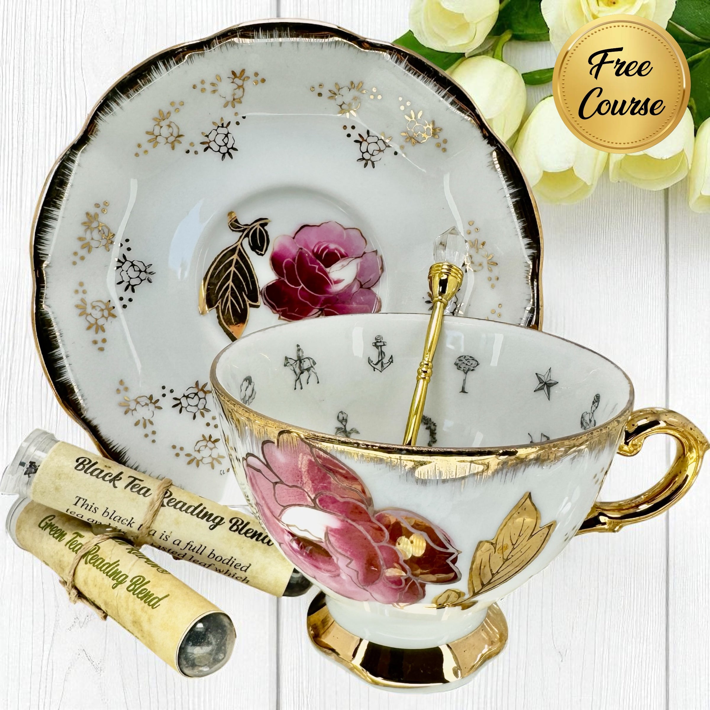 Vintage roses teacup & saucer, includes gold spoon and tea samples.