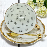 Internal view of tea leaf reading symbols vintage roses tea set