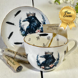 Teacup and saucer set with crow design, accompanied by tea packaging and a 'Free Course' badge.