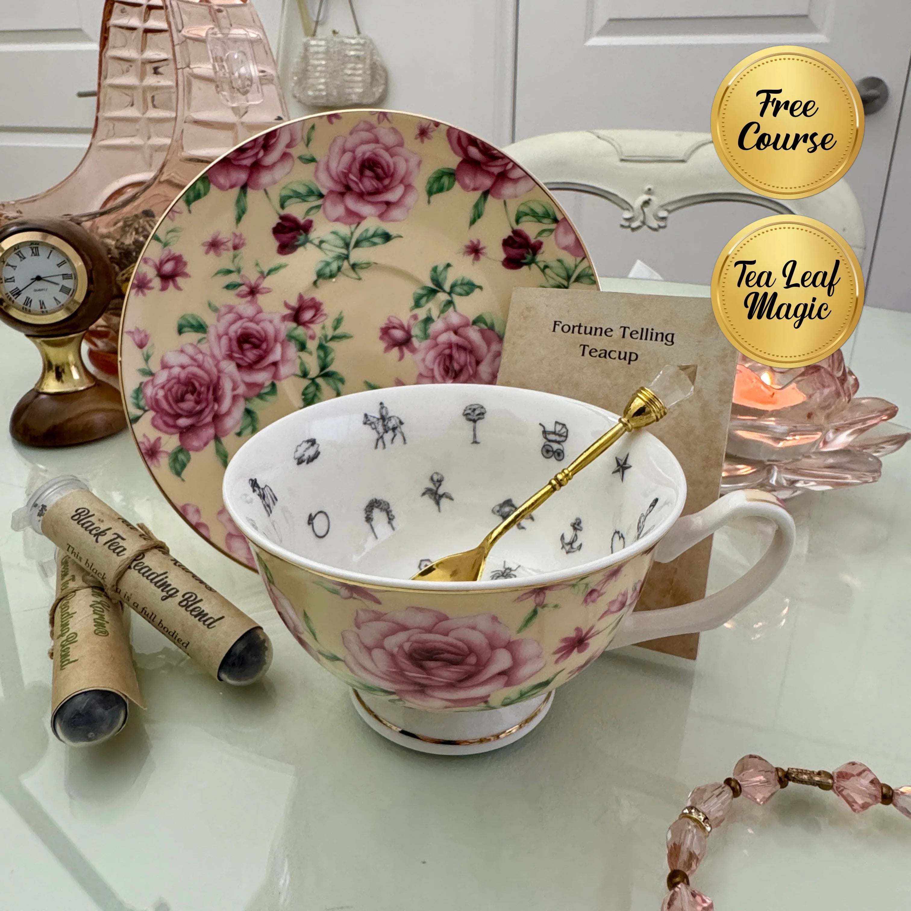 Pink butter rose floral tea leaf reading cup set with gold crystal teaspoon, loose-leaf tea tube samplers and saucer, displayed with Fortune Telling Teacup card