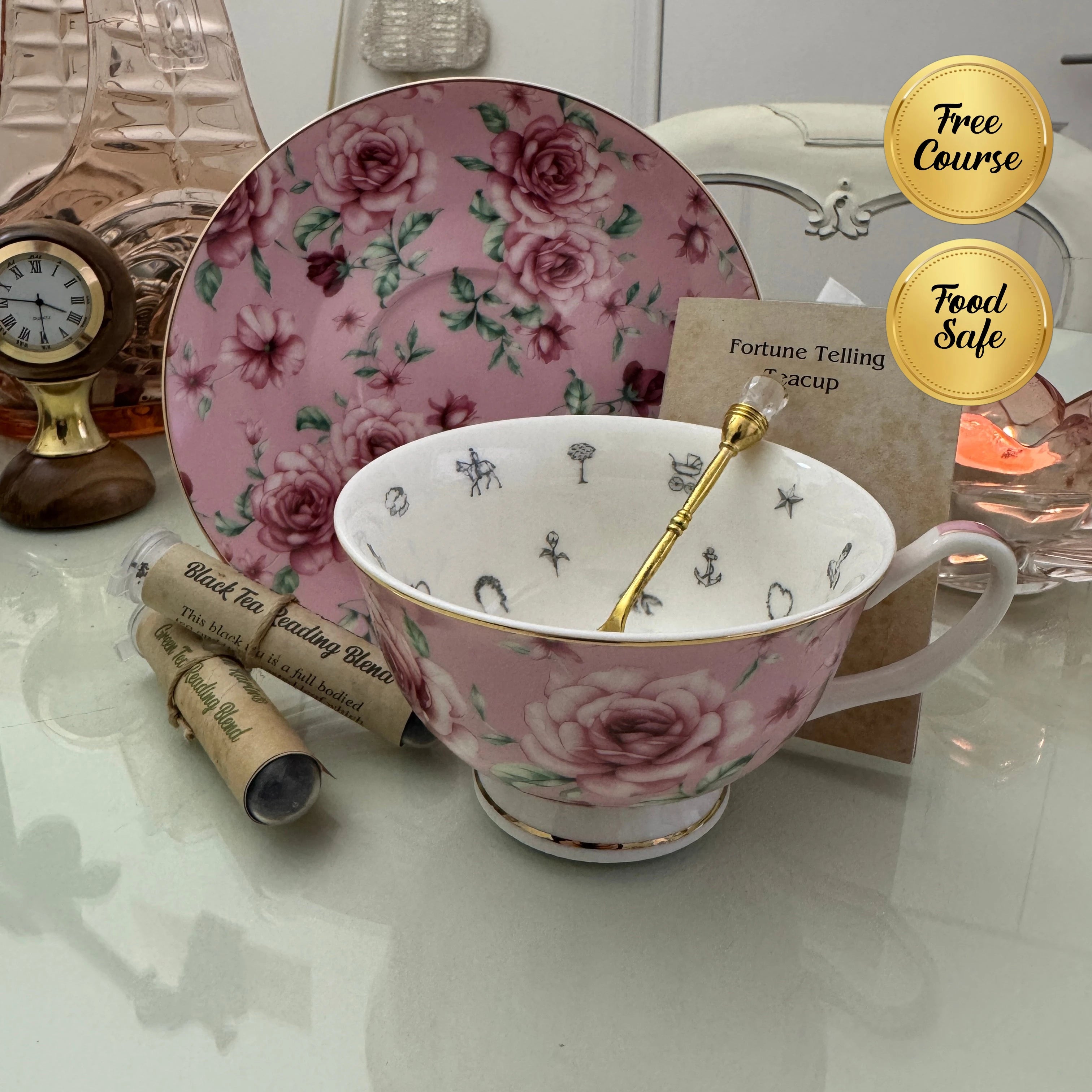 Pink rose floral tea leaf reading cup set with gold teaspoon, loose-leaf tea tube samplers and saucer, displayed with Fortune Telling Teacup card