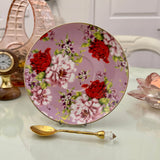 Pink red rose floral ceramic saucer with gold rim from tea leaf reading cup set, displayed with gold crystal teaspoon