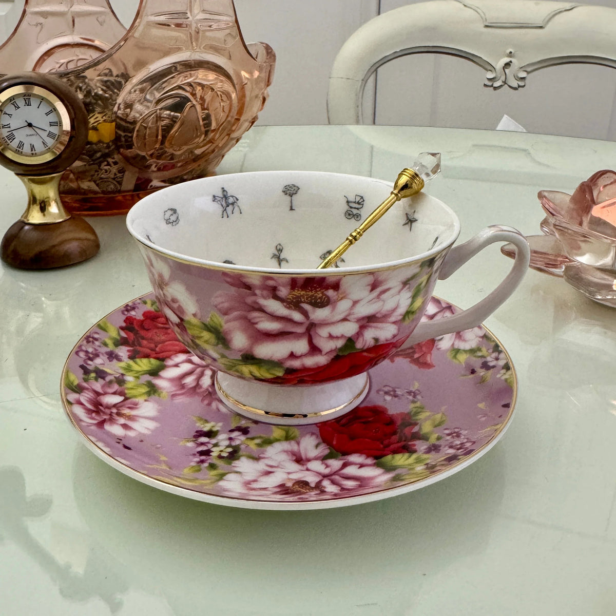 Pink Red Rose teacup standing upright on its saucer