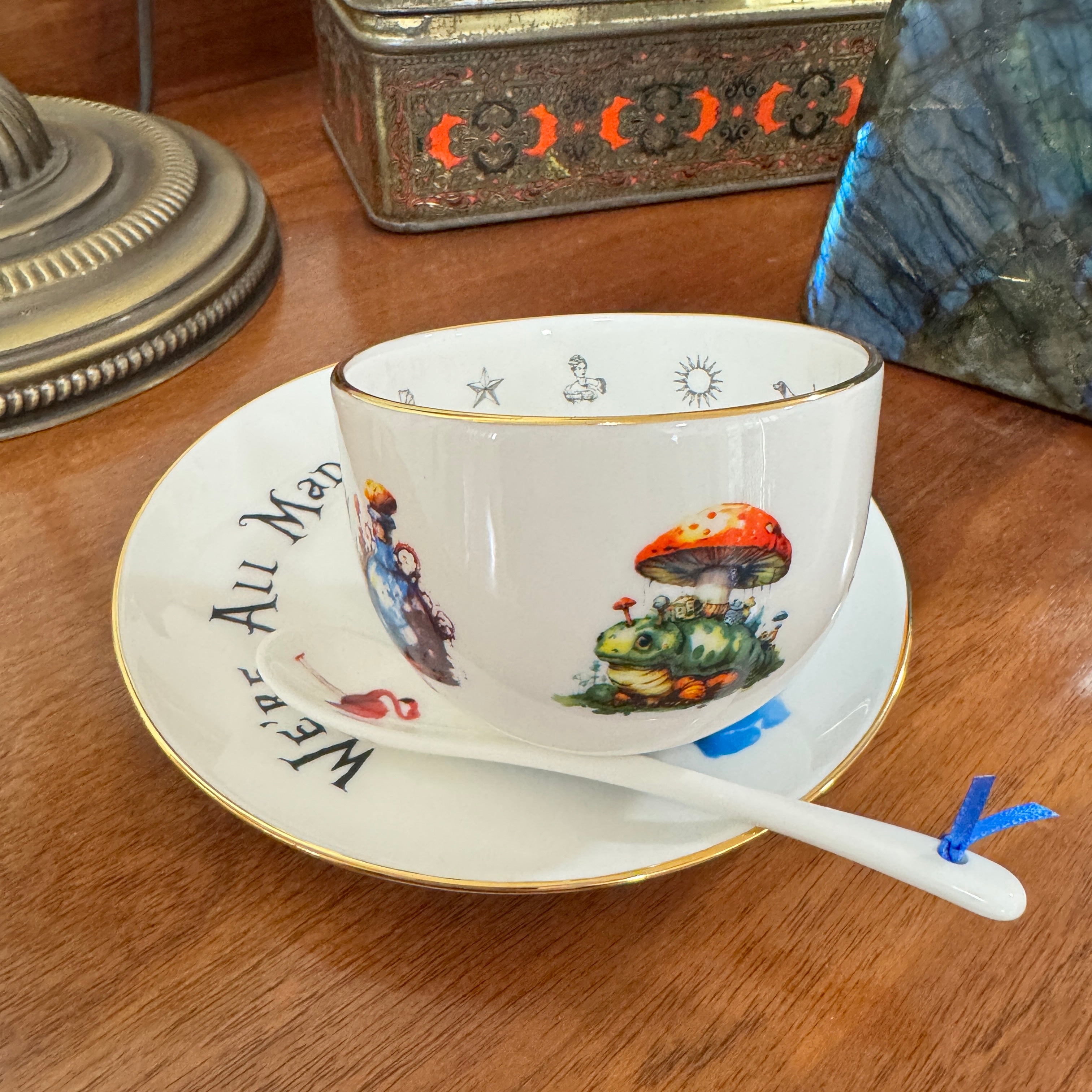 Teacup with artistic design on a wooden surface