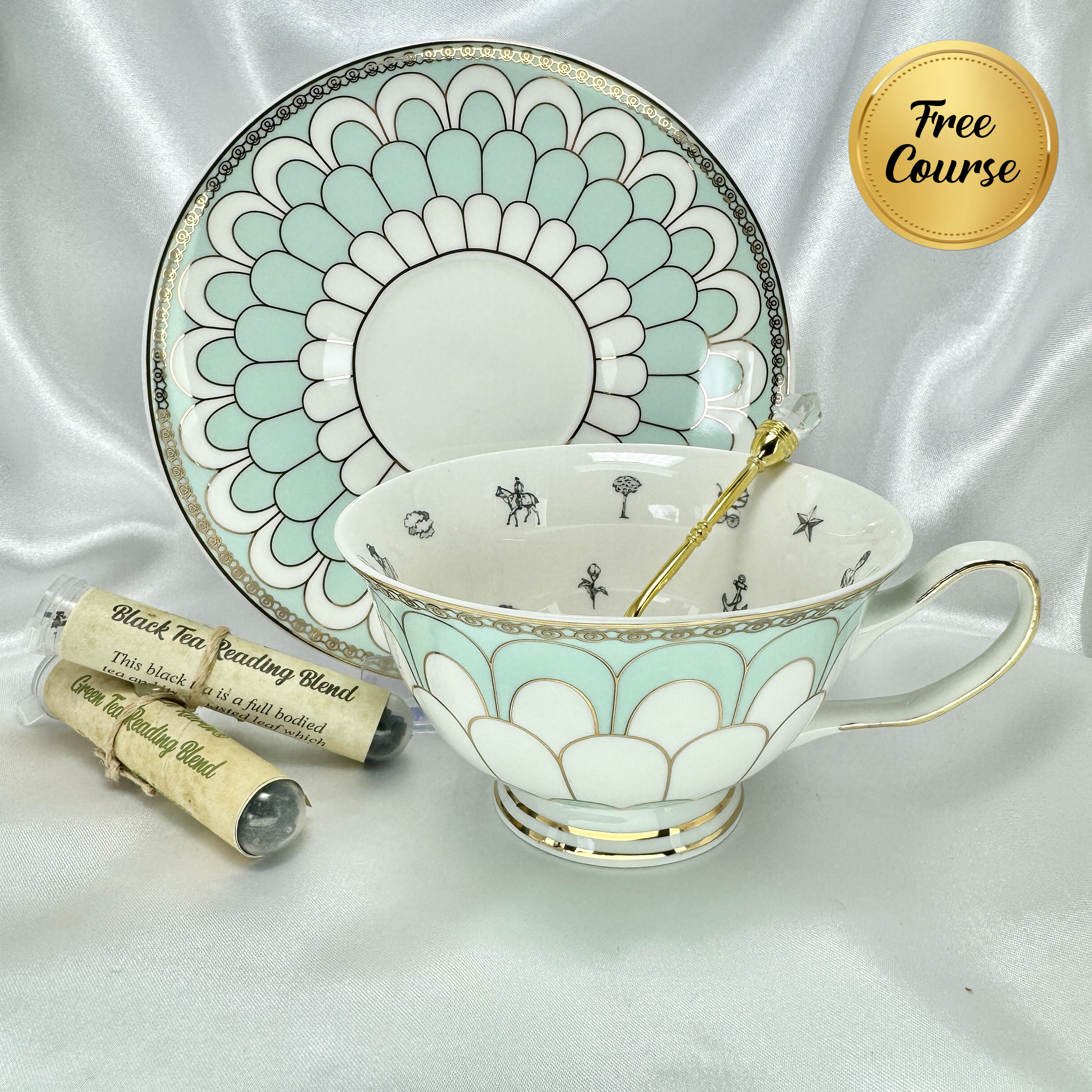 Fortune telling tea cup and saucer set with mint green scalloped pattern, gold trim, crystal spoon, and two tea reading blend samples.