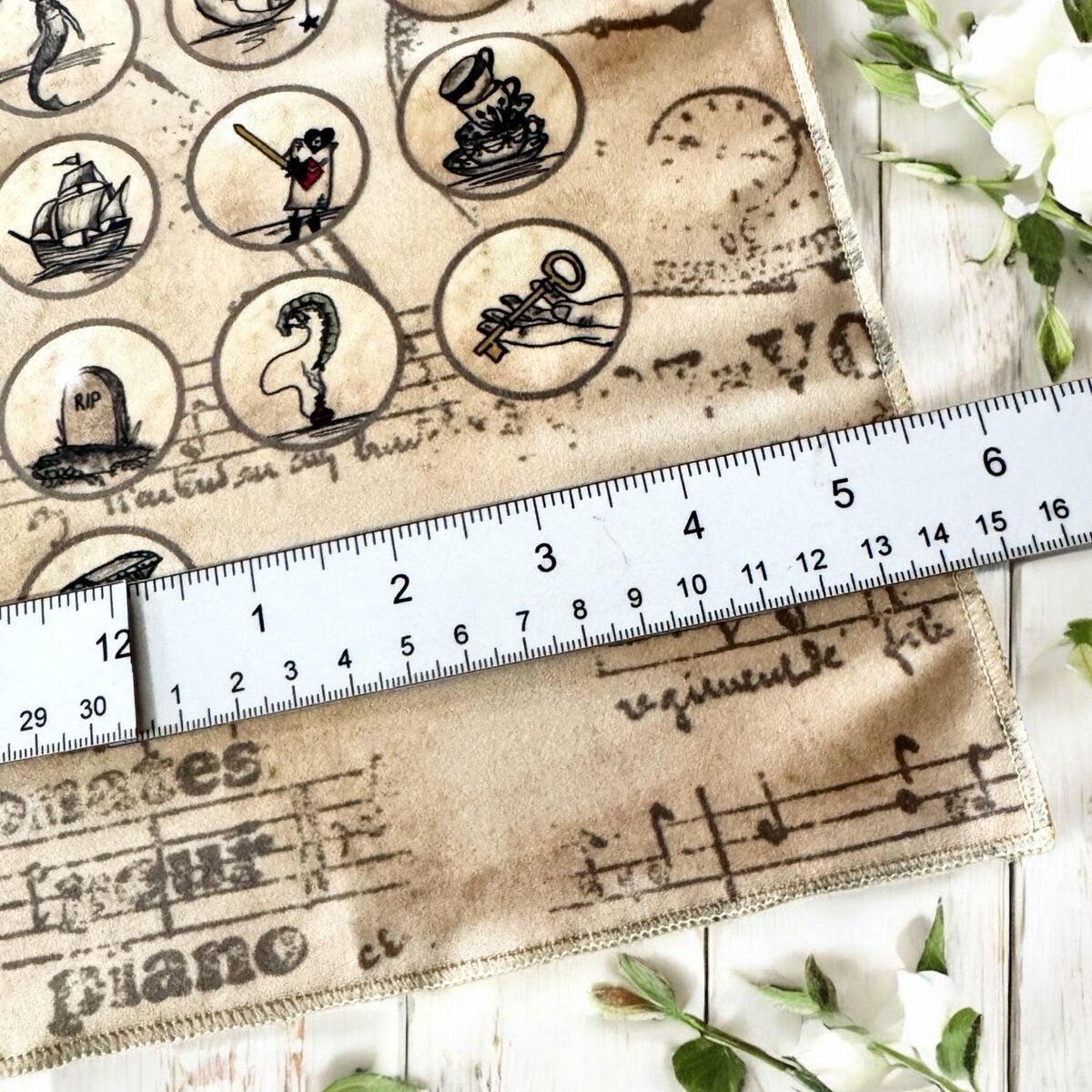 Alice in Wonderland tea leaf reading coins arranged for a divination reading
