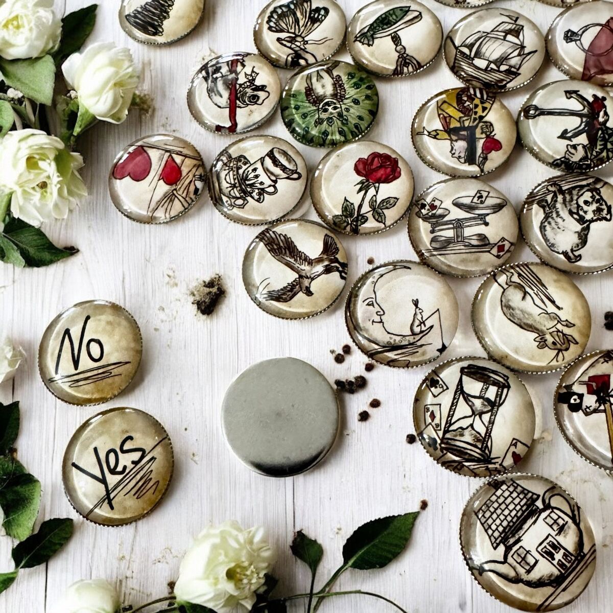 Close-up view of an Alice in Wonderland tea leaf reading coin