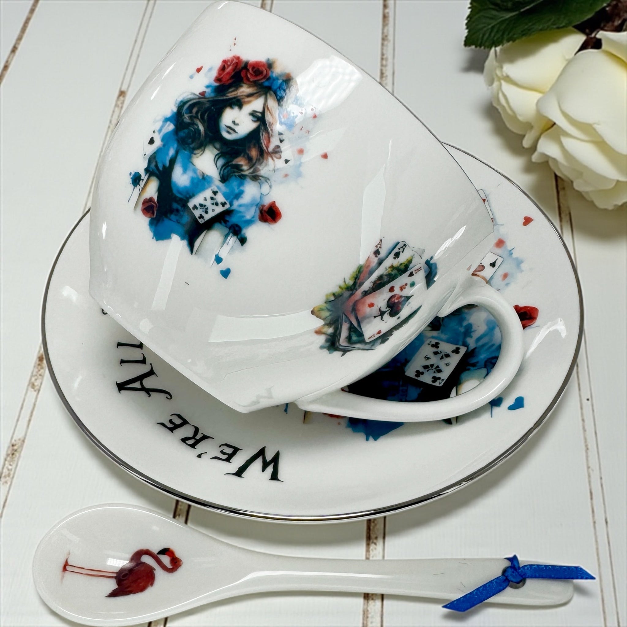 Tea set with artistic design on a white surface