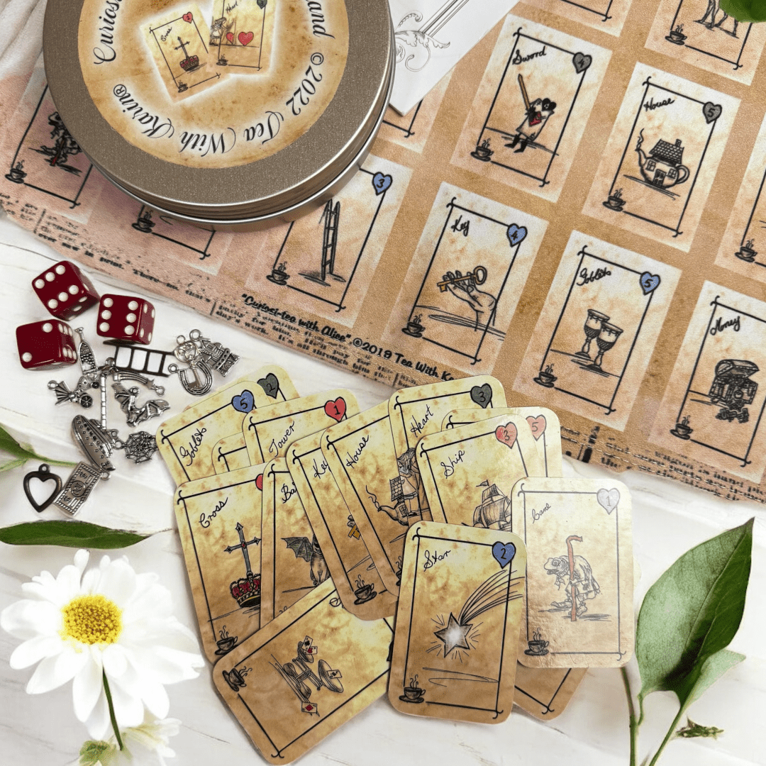 This is a unique divination system all in one tinned kit.  it is Alice in Wonderland style. It is based upon tea leaf reading and Alice in Wonderland theme. It has a washable spandex mat and 18 mini cards and 18 charms and 3 dice.