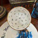 Teacup with decorative design on a wooden surface