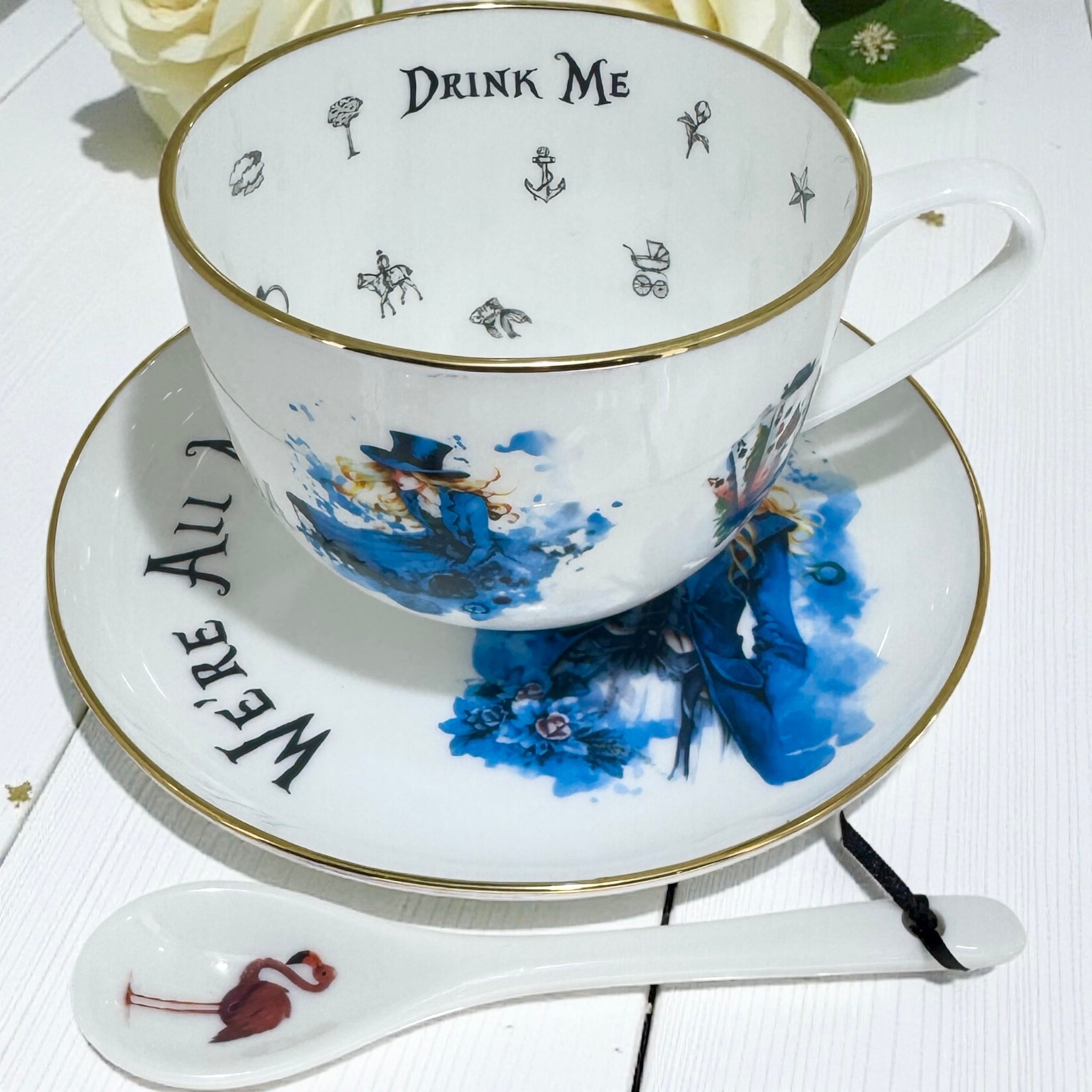 Luxury Mad Hatter Tea Party Set, including teacup, saucer, and pink flamingo spoon, ideal collectible gift.