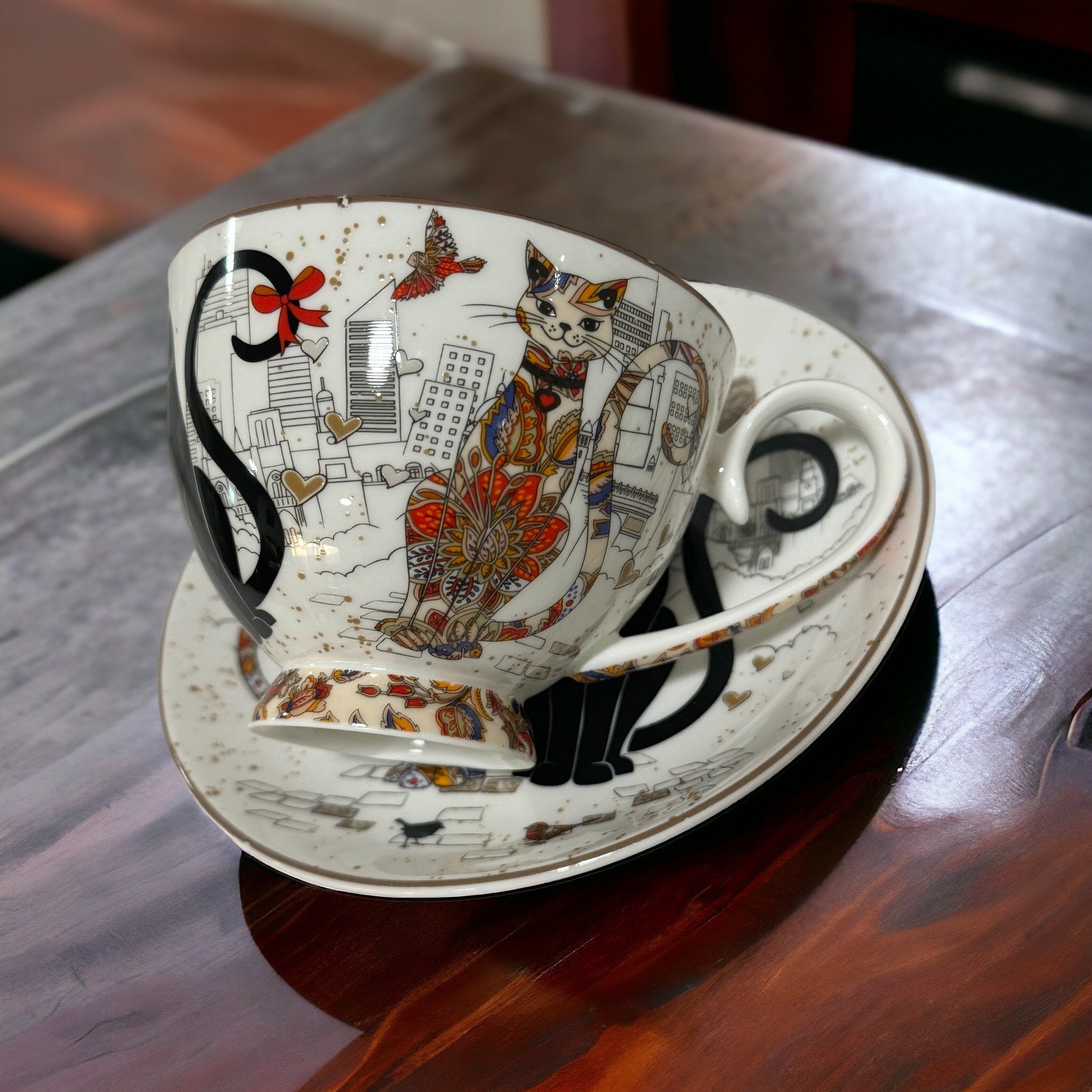 Unique teacup featuring a mystical cat fortune teller, surrounded by magical elements. Full tea leaf reading kit with free course. Perfect gift. 