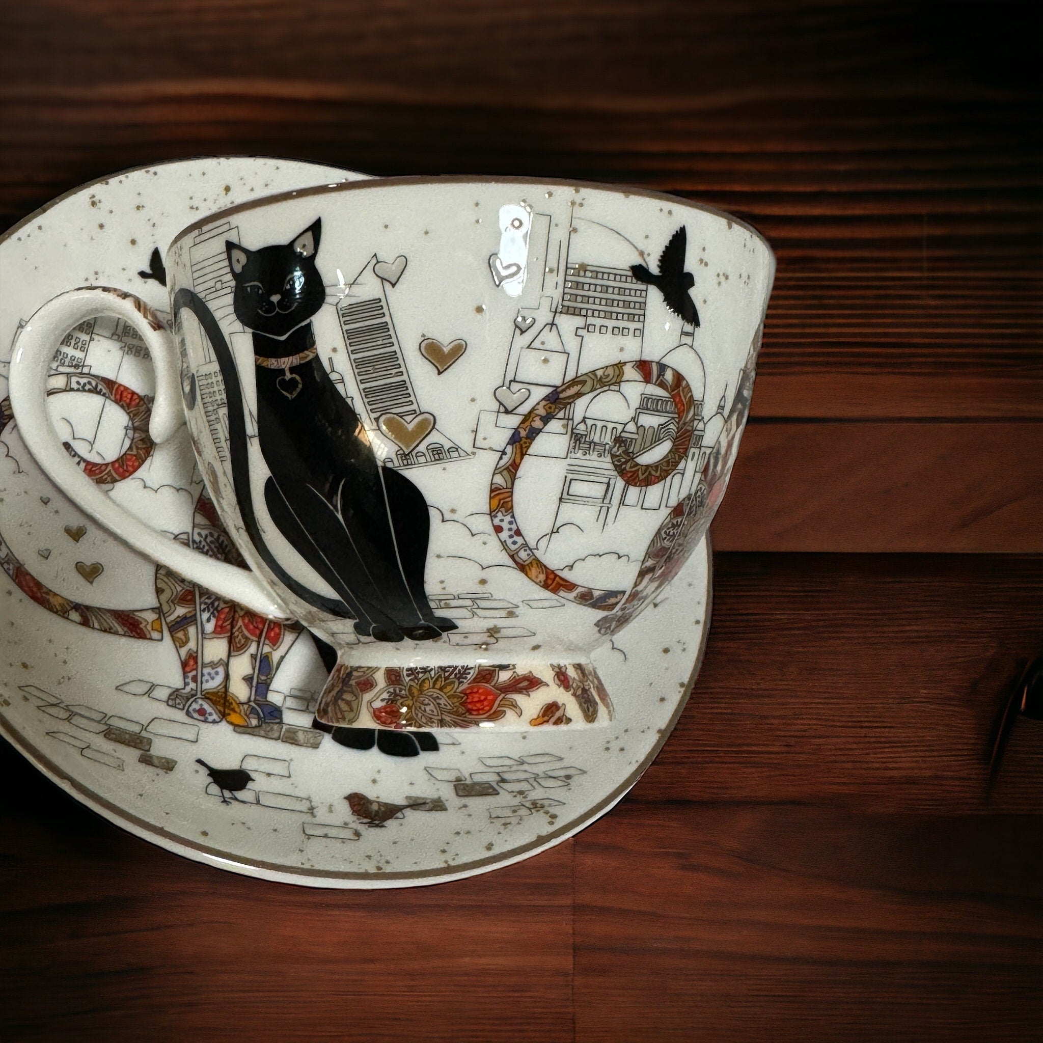 Elegant teacup adorned with a detailed illustration of a cat in a fortune teller's attire. Full tea leaf reading kit with free course. Perfect gift. 