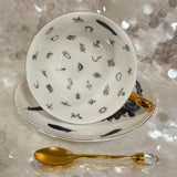 Raven fortune teller teacup.