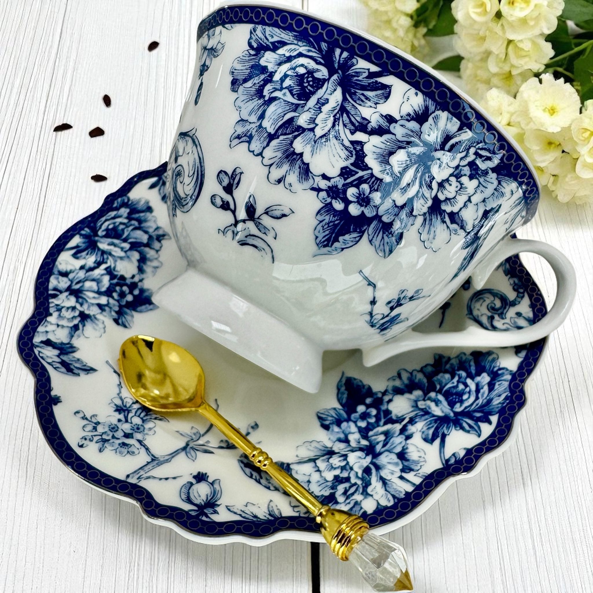 Decorative tea set with blue bird illustrations, perfect for special tea rituals