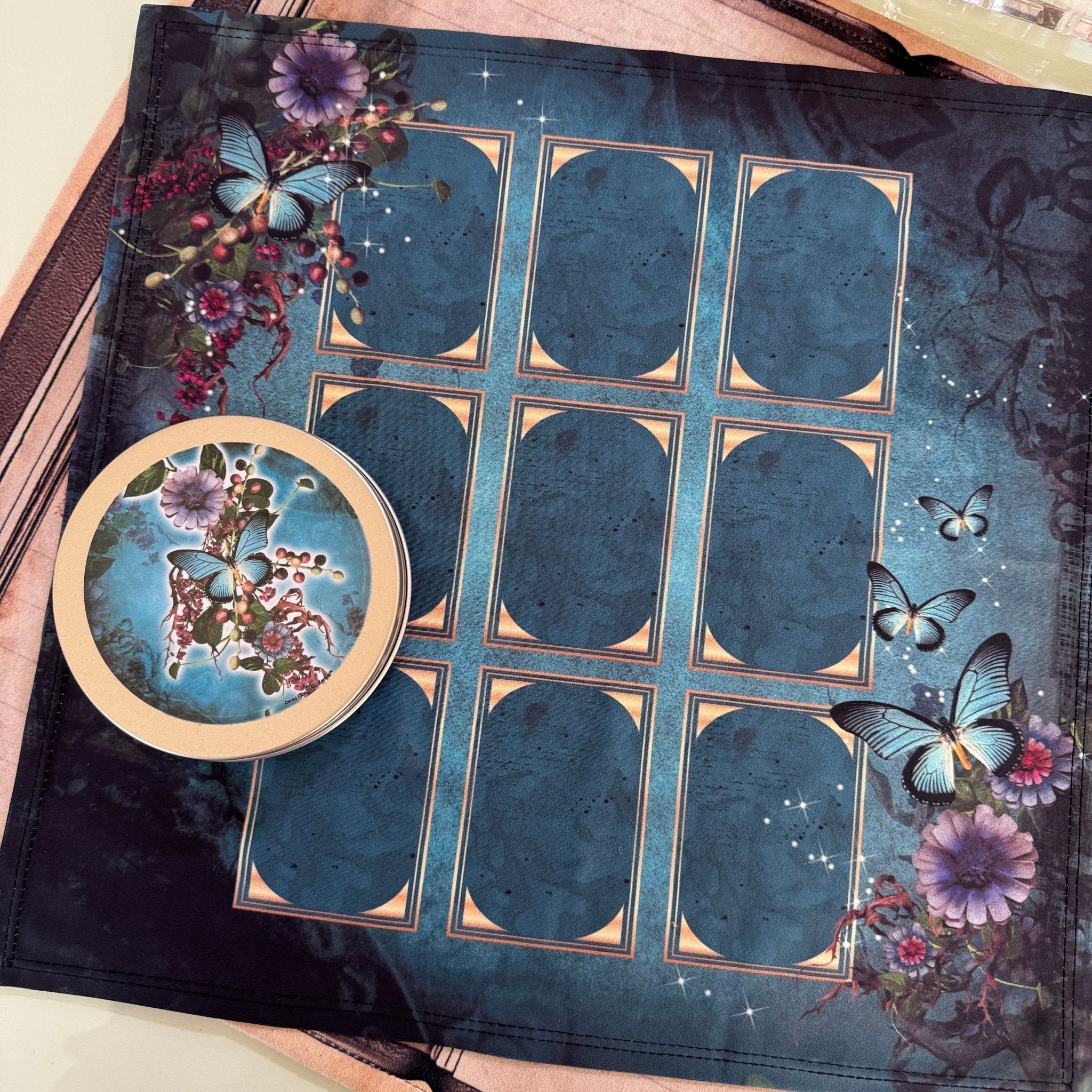 50-card tea leaf reading deck with high-gloss finish, diverse symbols including gender and relationship icons, accompanied by a booklet, cotton bag, symbol dictionary