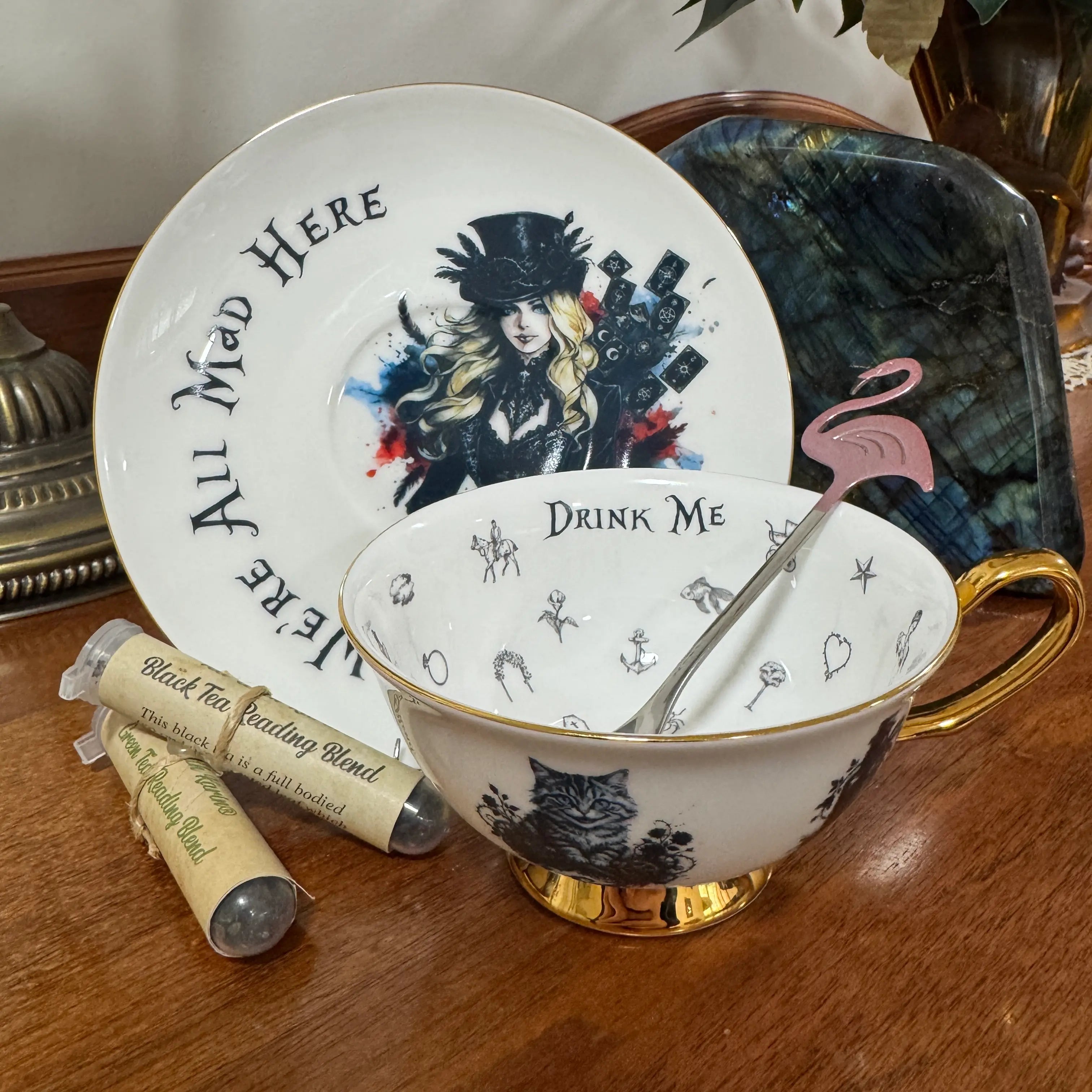 Gothic Alice in Wonderland tea set with We're All Mad Here saucer, Drink Me teacup, flamingo spoon and black and green tea reading blends