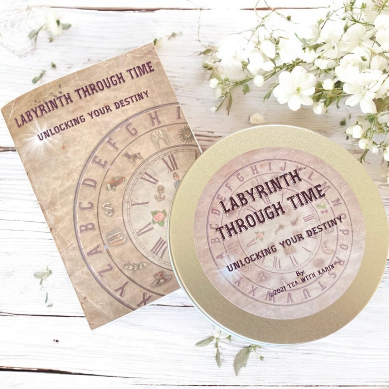 Labyrinth Through Time game packaging with decorative elements on a wooden surface.