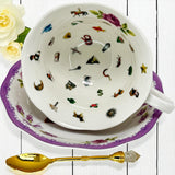Lavender tea blends and the teacup set displayed together for a reading