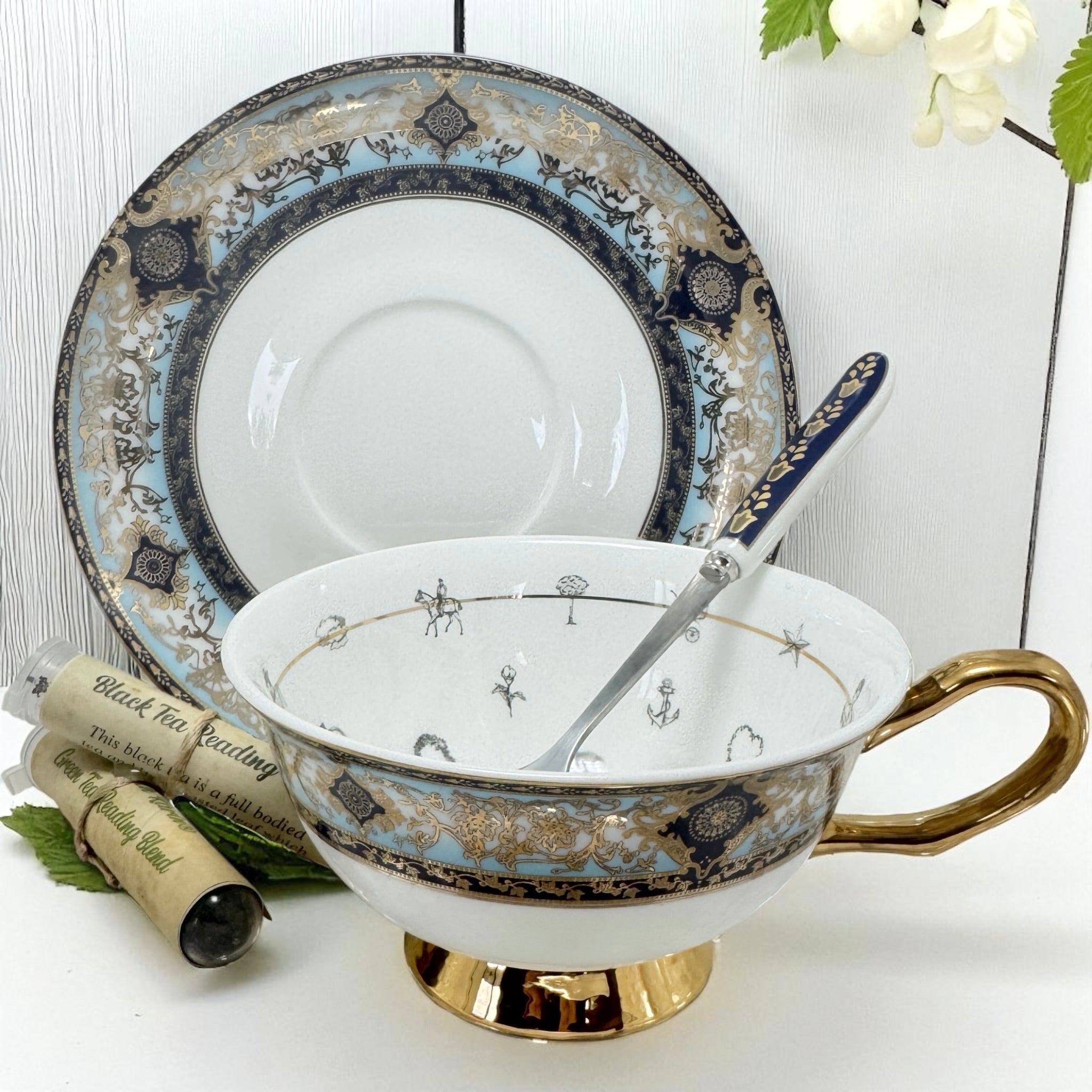 blue and gold teacup for intuitive tea leaf interpretation and fortune telling.
