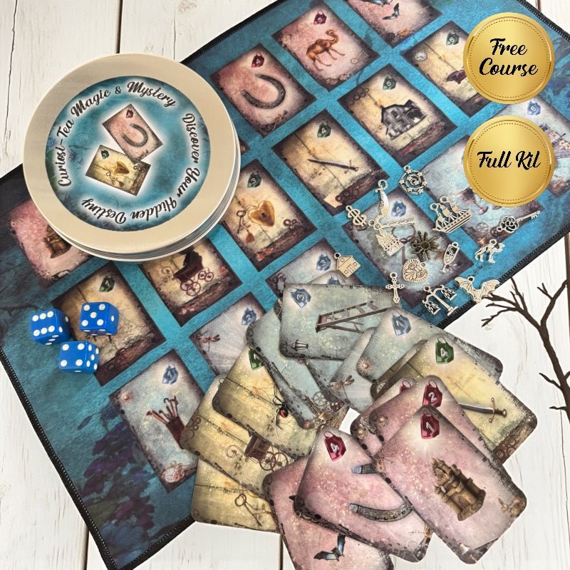 Tea cards with illustrations, dice, and a tin on a wooden surface
