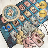 Tea cards with illustrations, dice, and a tin on a wooden surface